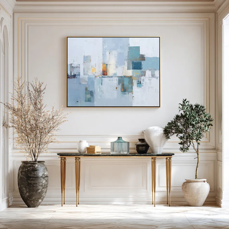 Modern interior with abstract art, console table, and decorative items.