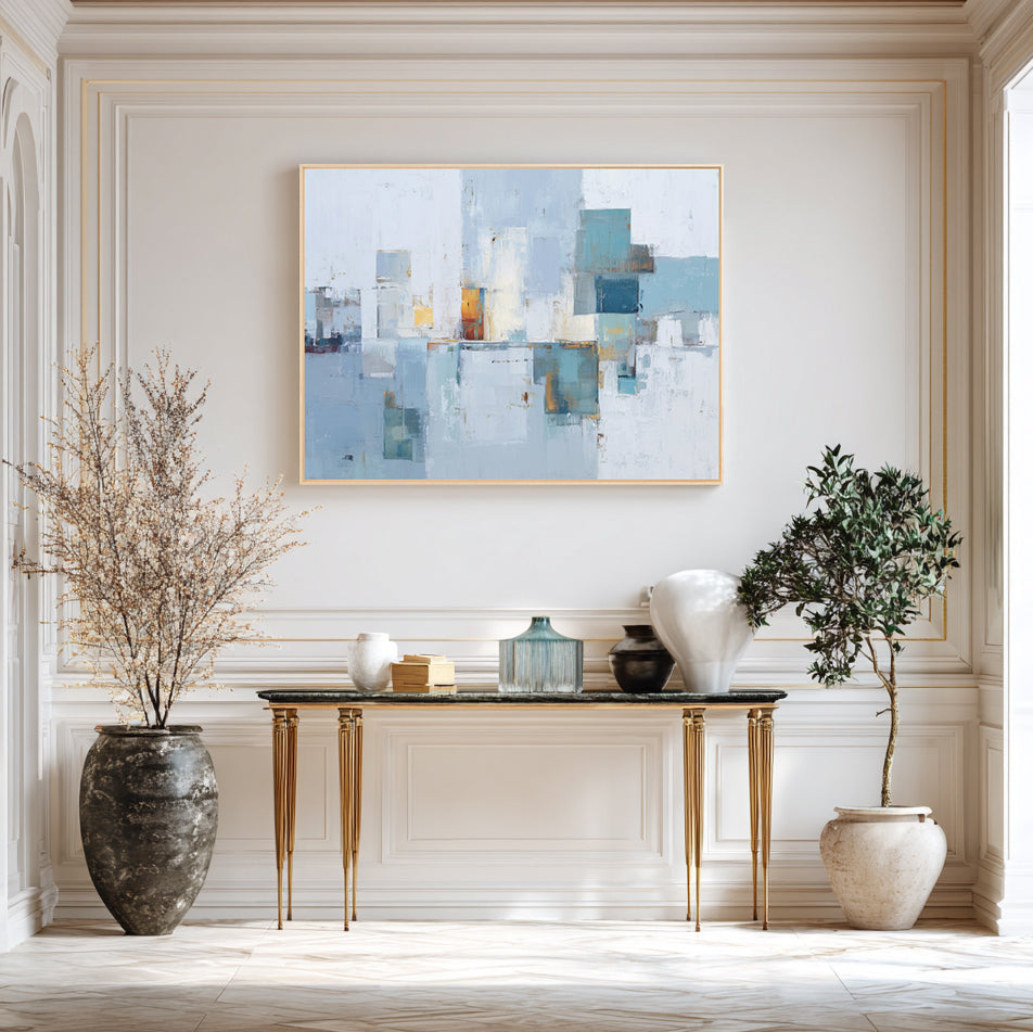 Modern interior with abstract art, console table, and decorative items.