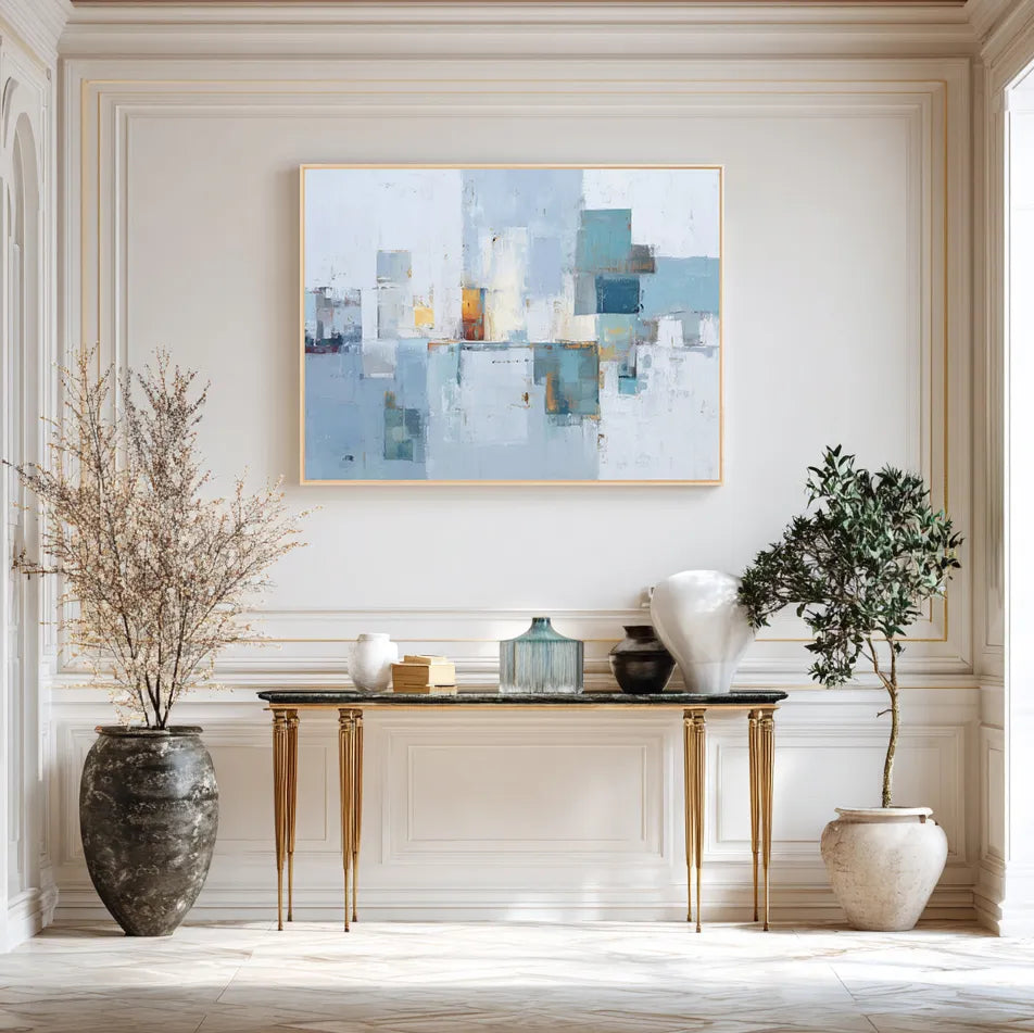Modern interior with abstract art, console table, and decorative items.