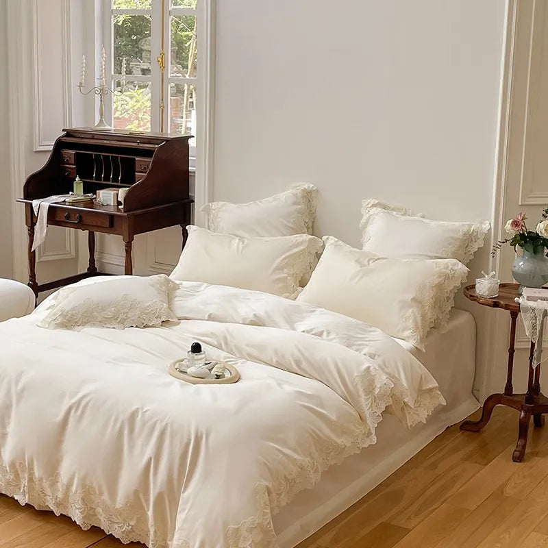 Neatly made bed with white bedding in a bright bedroom.
