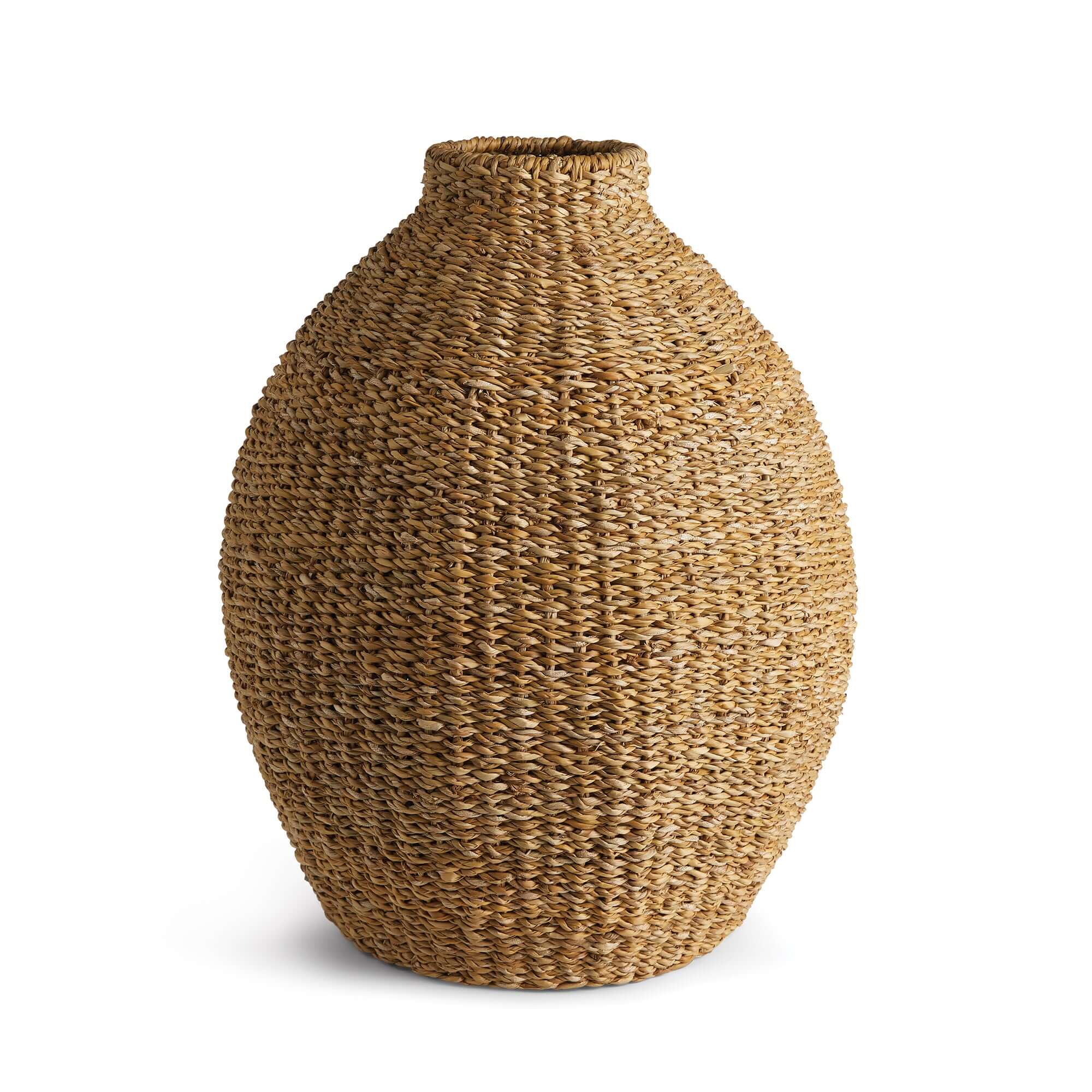 Woven brown seagrass vase on a white background