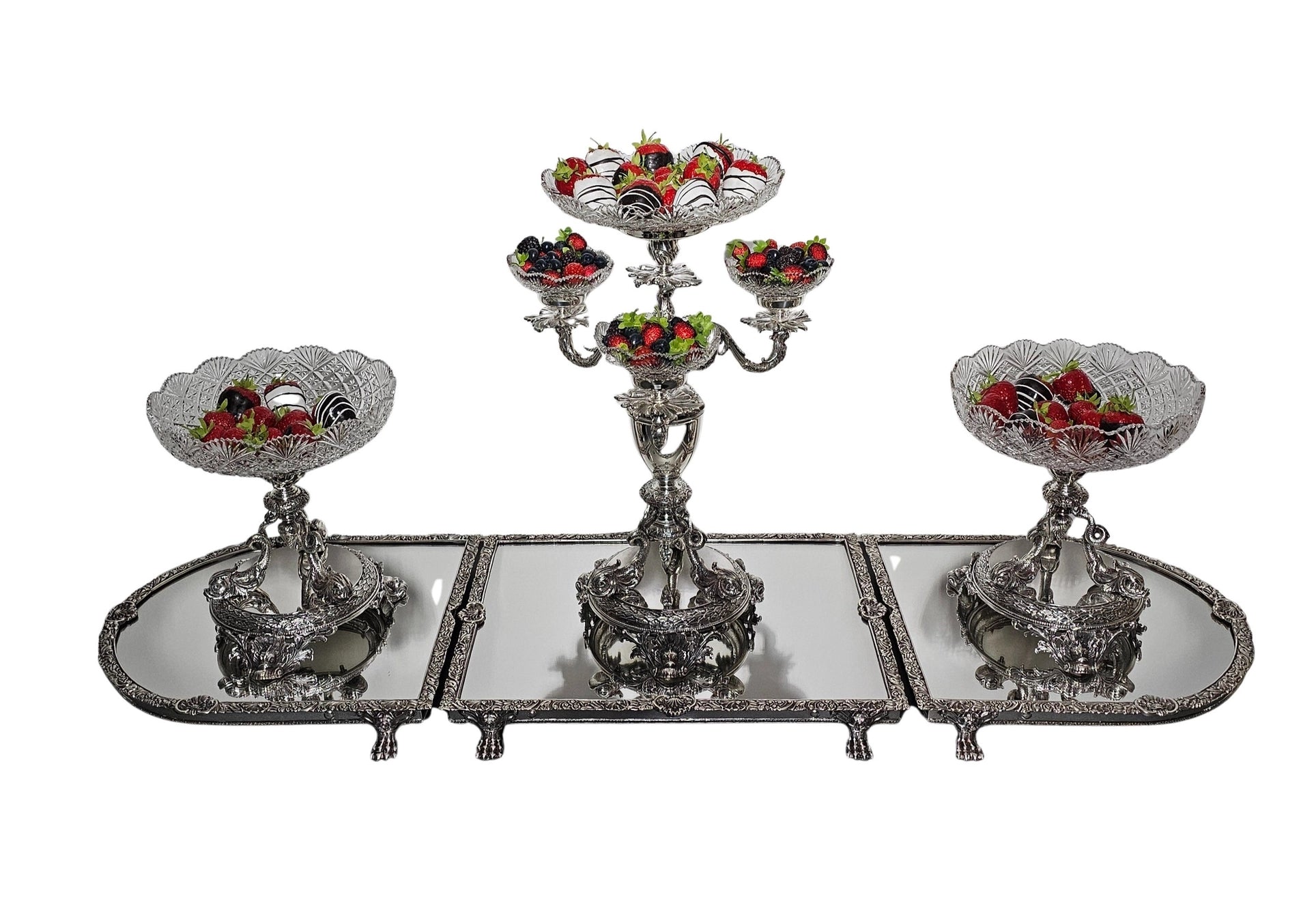 Decorative mirror plateau silver plated tray set with fruit bowls on a white background