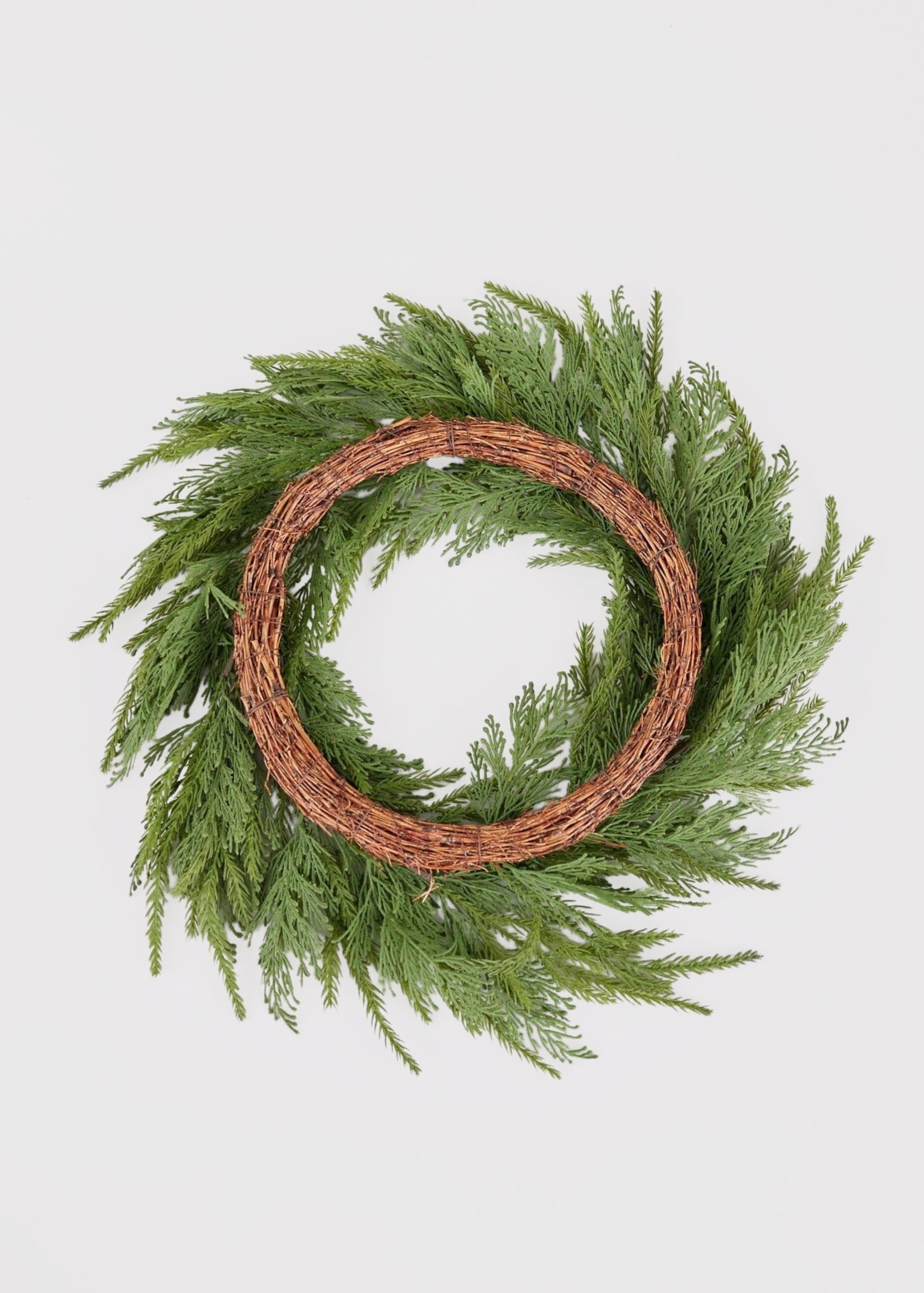 UV Treated Faux Indoor/Covered Outdoor Cedar Wreath - 24"