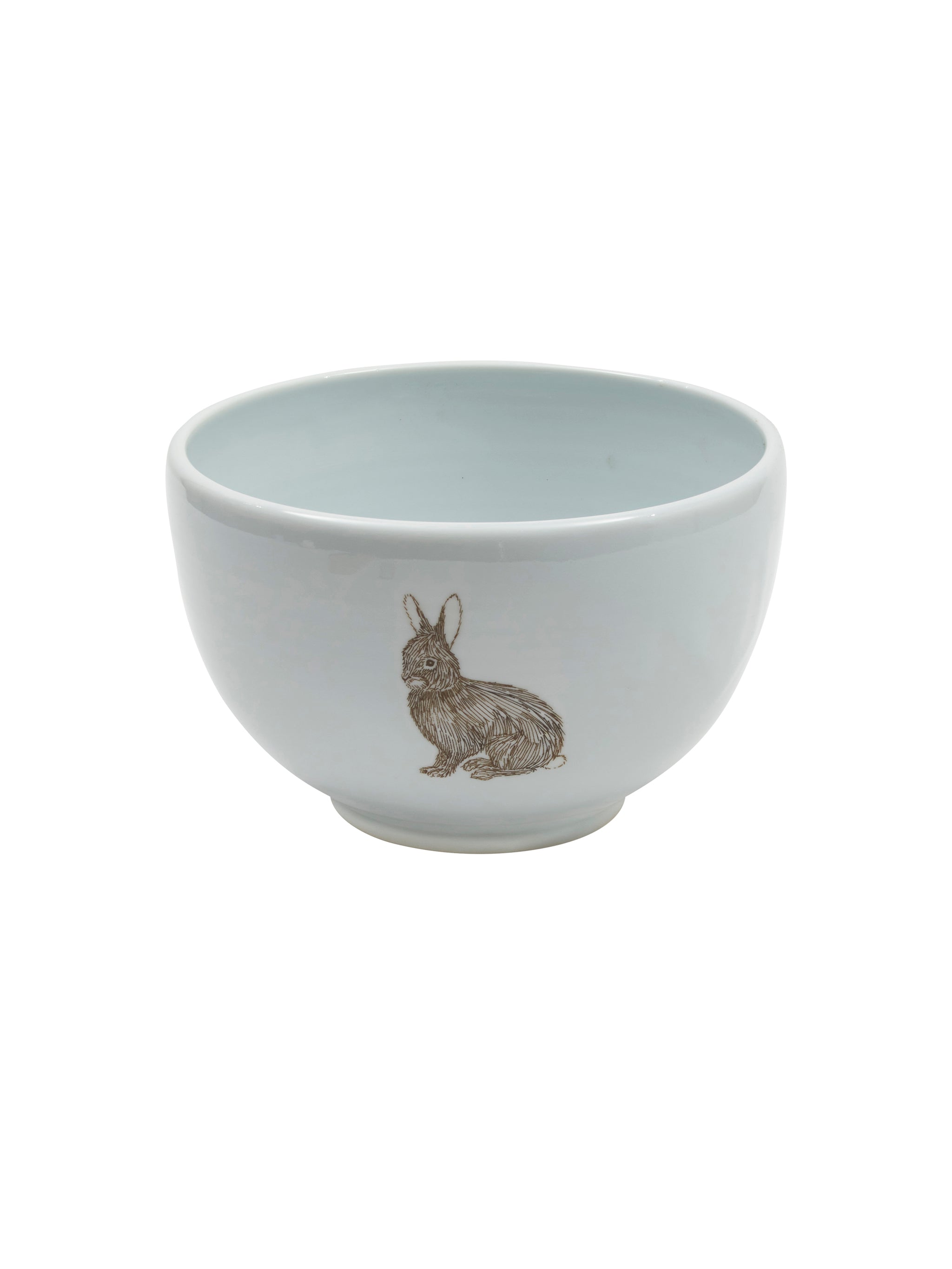 White ceramic bowl with a rabbit design on a white background