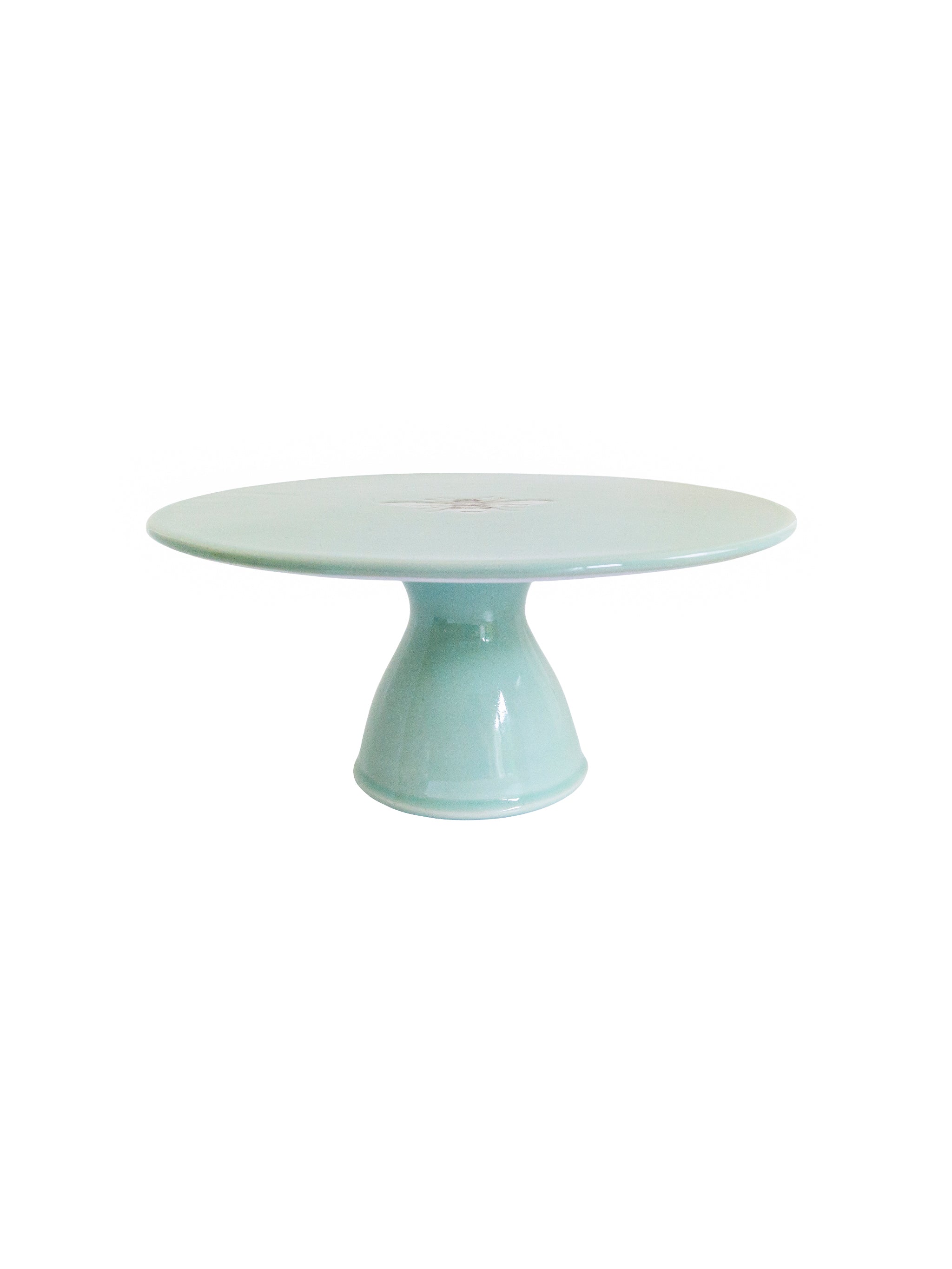 Cake stand with bee motif on a white background