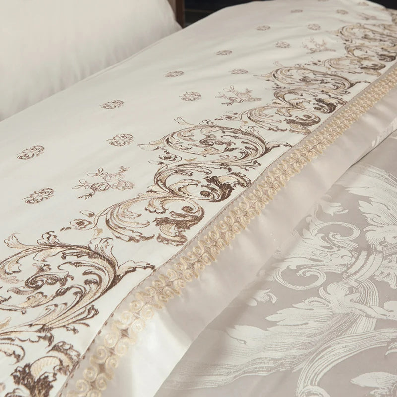 Decorative bedspread with intricate patterns on a bed