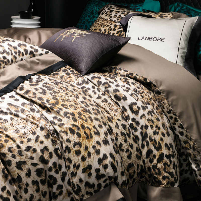 Leopard print bedding set on a bed with 'LANBORE' branding.