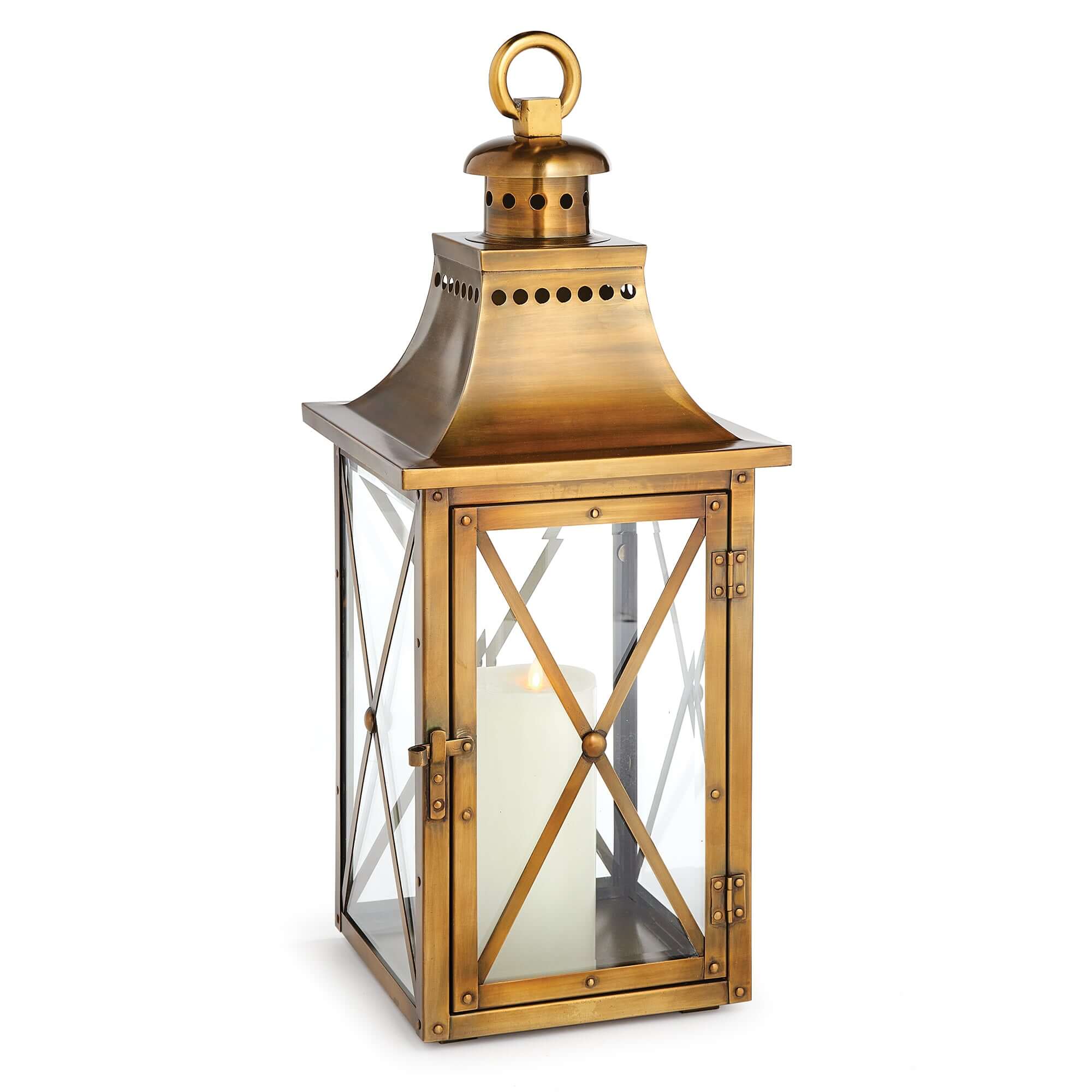 Gold lantern with a candle inside on a white background
