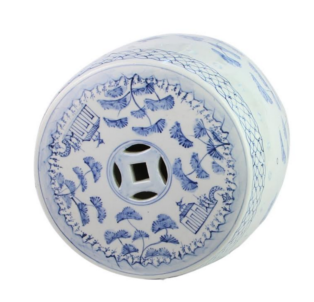 Ceramic stool with blue floral patterns on a white background