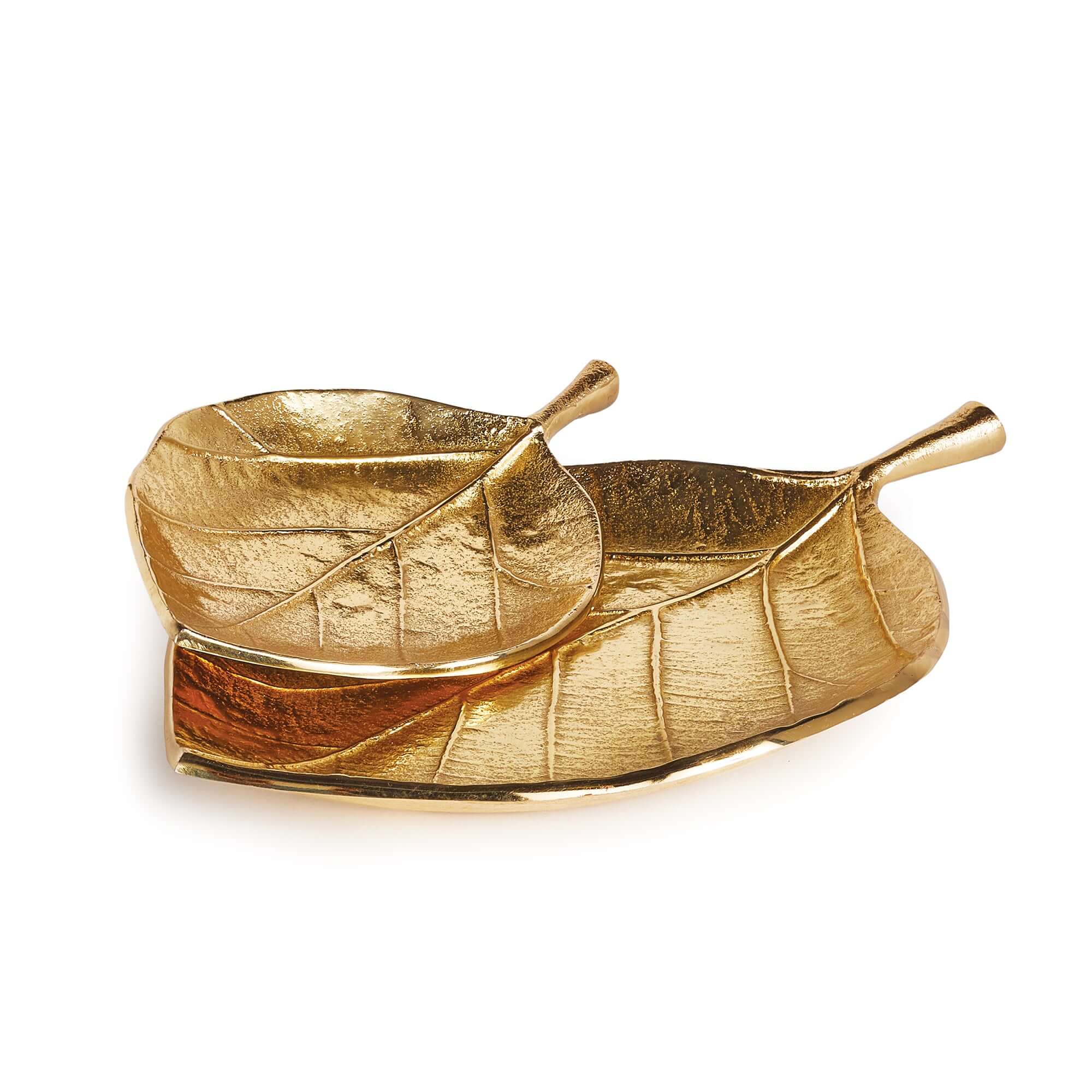 Gold leaf-shaped dish with spoon on a white background