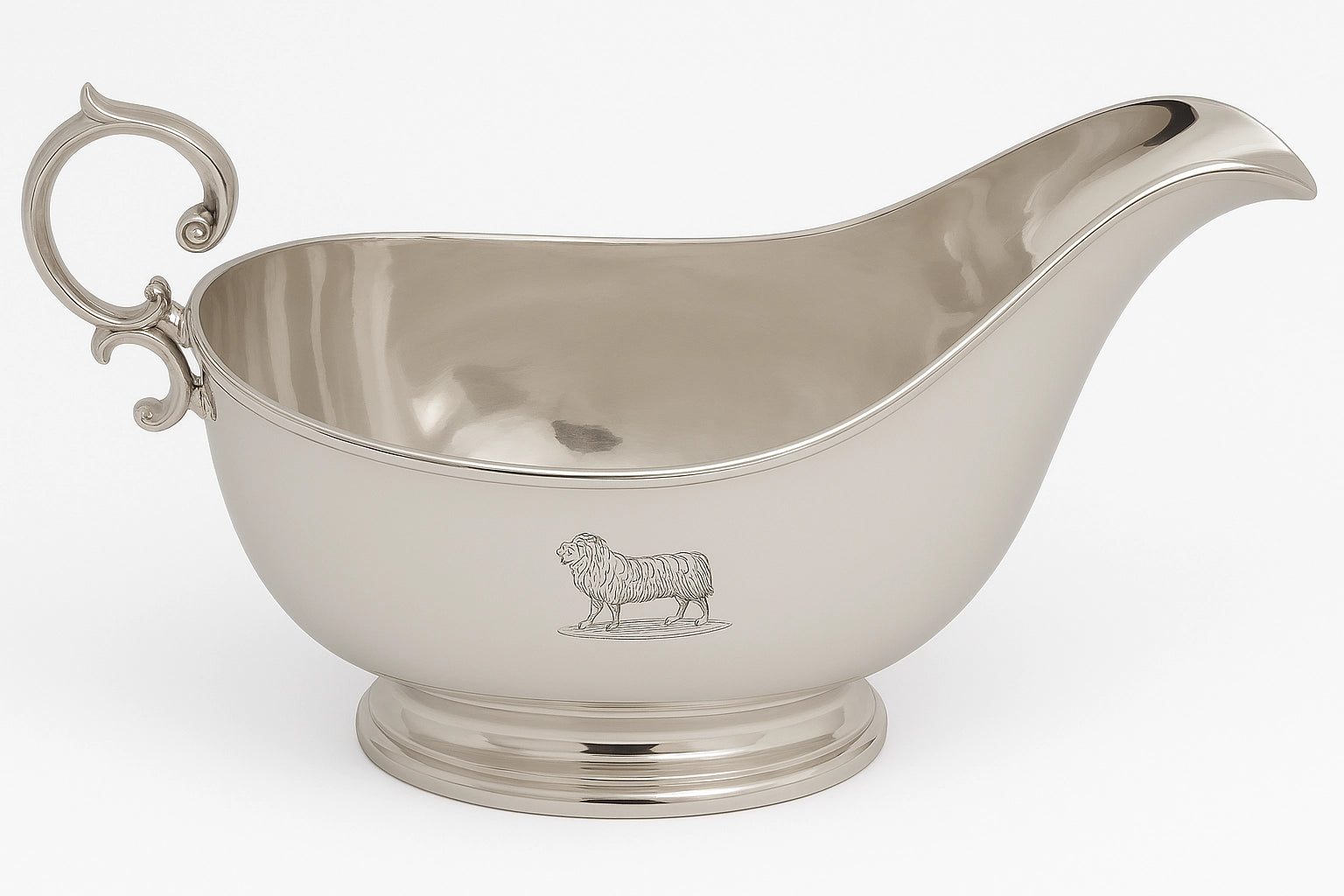 Classic English silver plate gravy boat with elegant curved form, pedestal base, and traditional styling