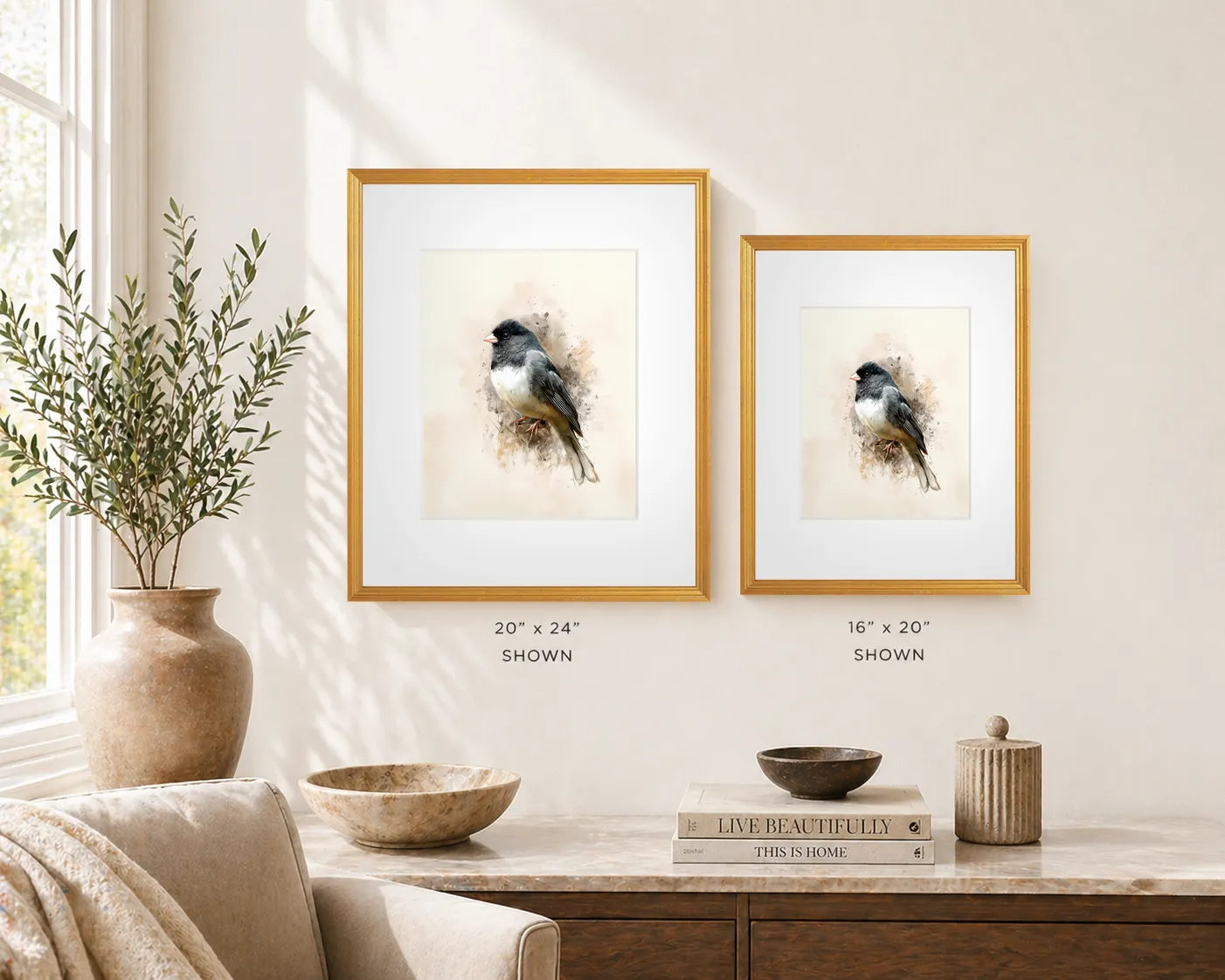 Dark-eyed junco framed wall art (Junco hyemalis) in antique gold frames, 16 × 20 and 20 × 24 sizes shown in neutral living room setting