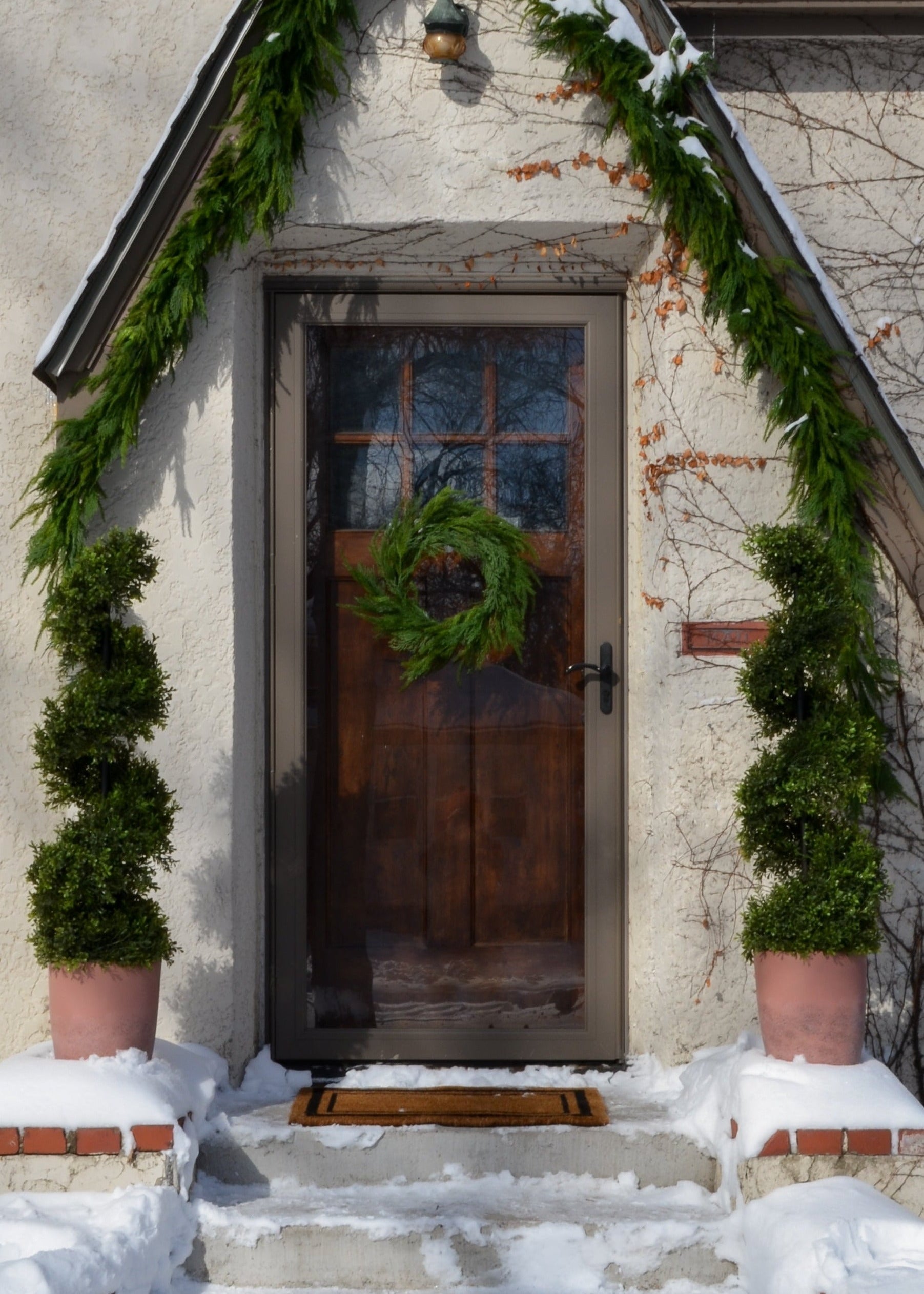 UV Treated Faux Indoor/Covered Outdoor Cedar Wreath - 24"