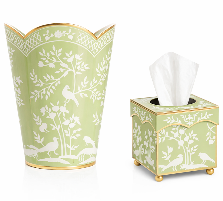 Green decorative waste bin and tissue box with white floral and bird pattern on a white background