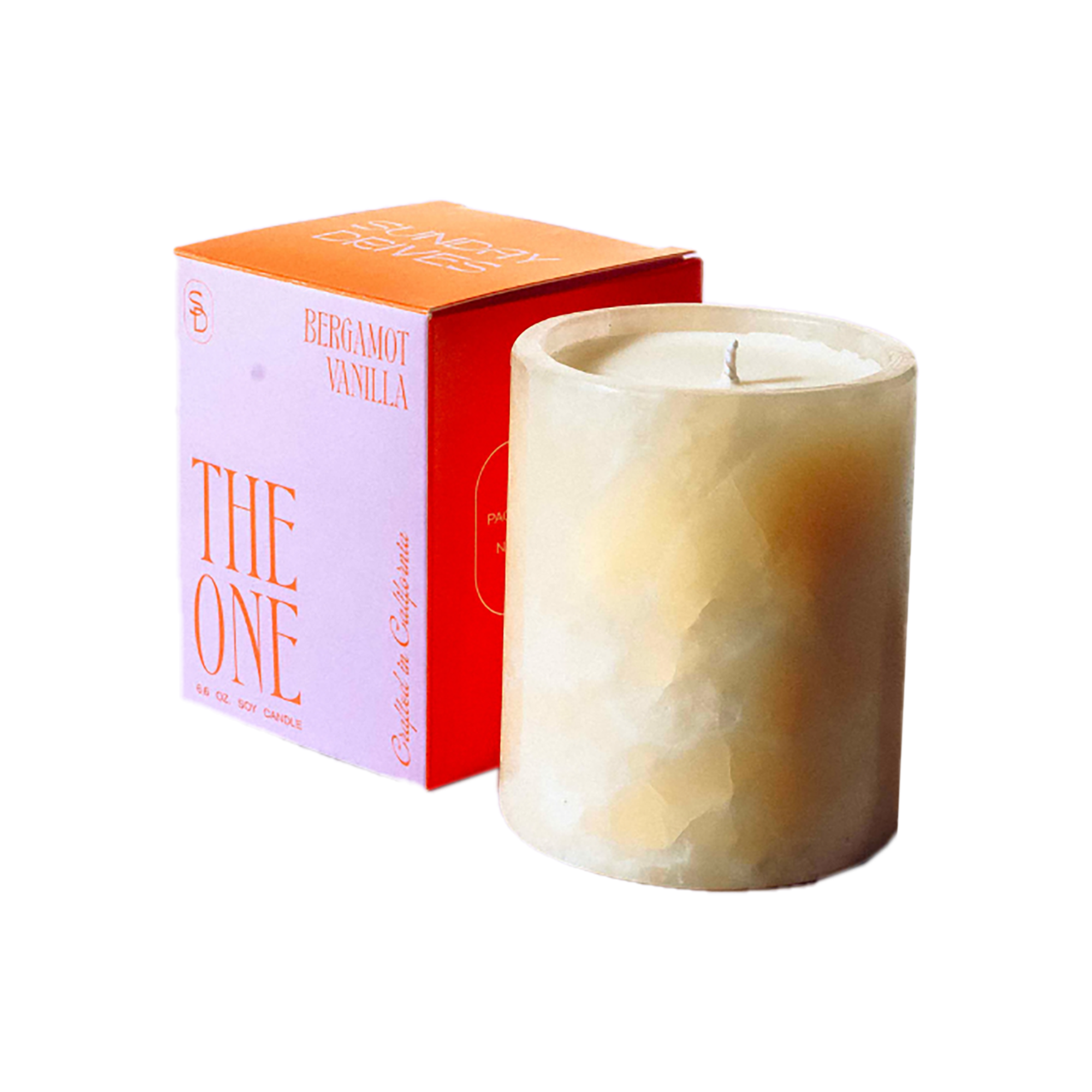 Candle with 'The One' packaging on a white background