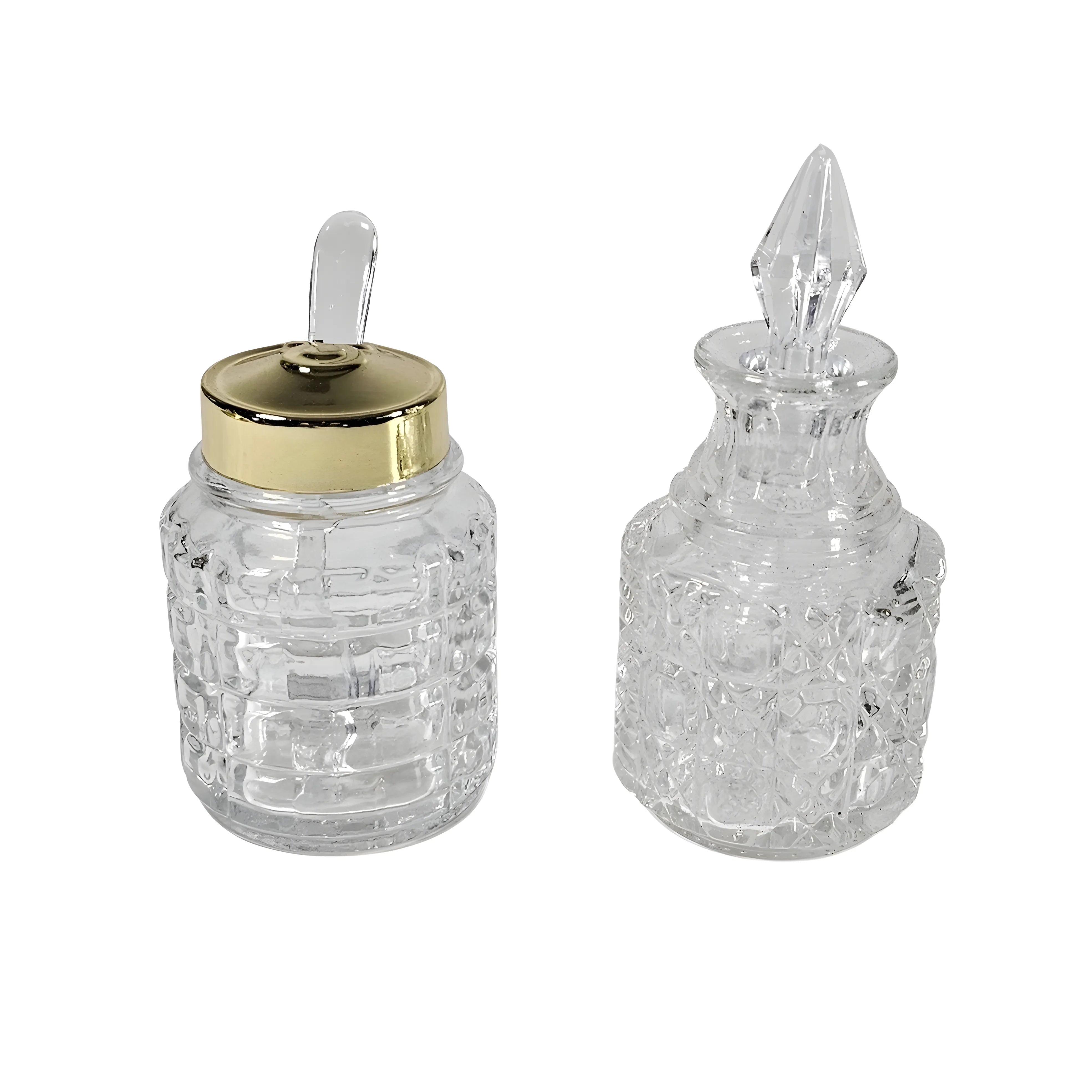 Cut glass condiment bottles with gold lids and stopper detail from Queen Anne revolving cruet set for elegant table service on a white background