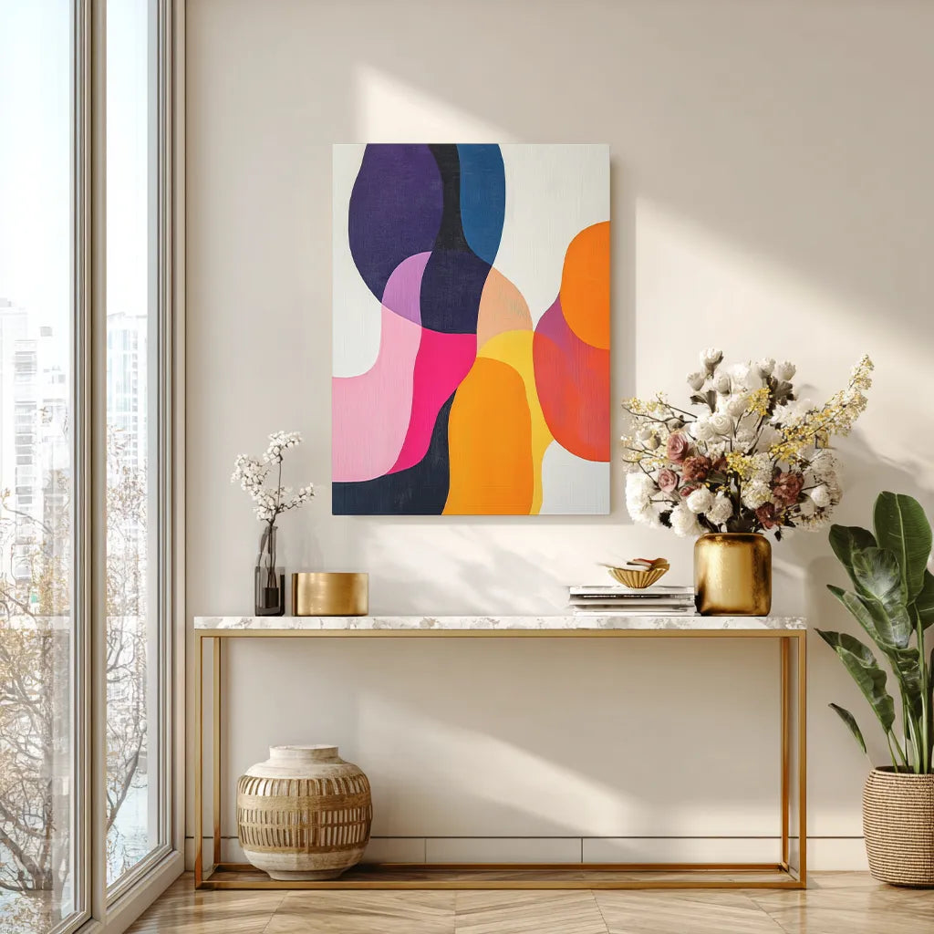 Modern interior with a colorful abstract painting on a wall above a console table.