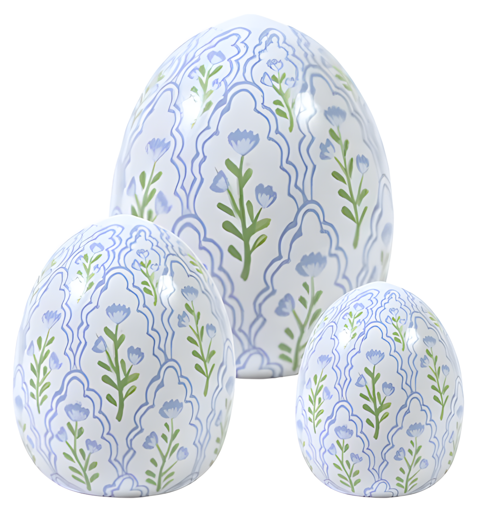 Three decorative eggs with floral pattern on a white background